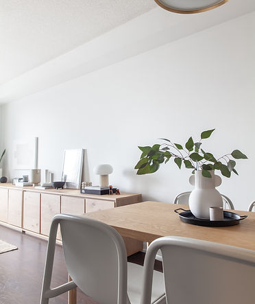 Dining table with an ornamental plant.