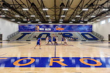 Basketball game in a modern commercial court.