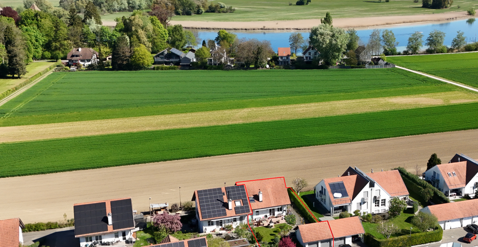 Wohnquartier Tägerwilen mit Rhein im Hintergrund