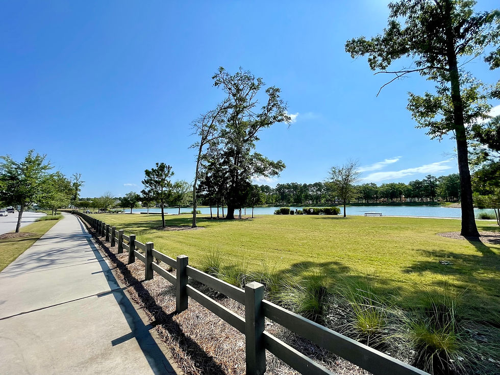 Walking trail and Bolden Lake in Carolina Park, a neighborhood in Mount Pleasant, South Carolina.