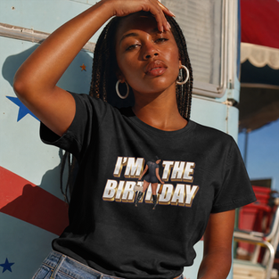 Gold and brown letters reading "I'm The Birthday" on a
black or white tshirt.