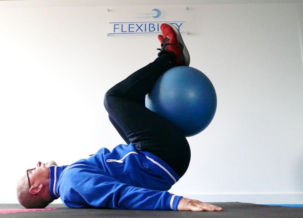 Simple Swiss ball reverse abdominal curl technique Core strength and