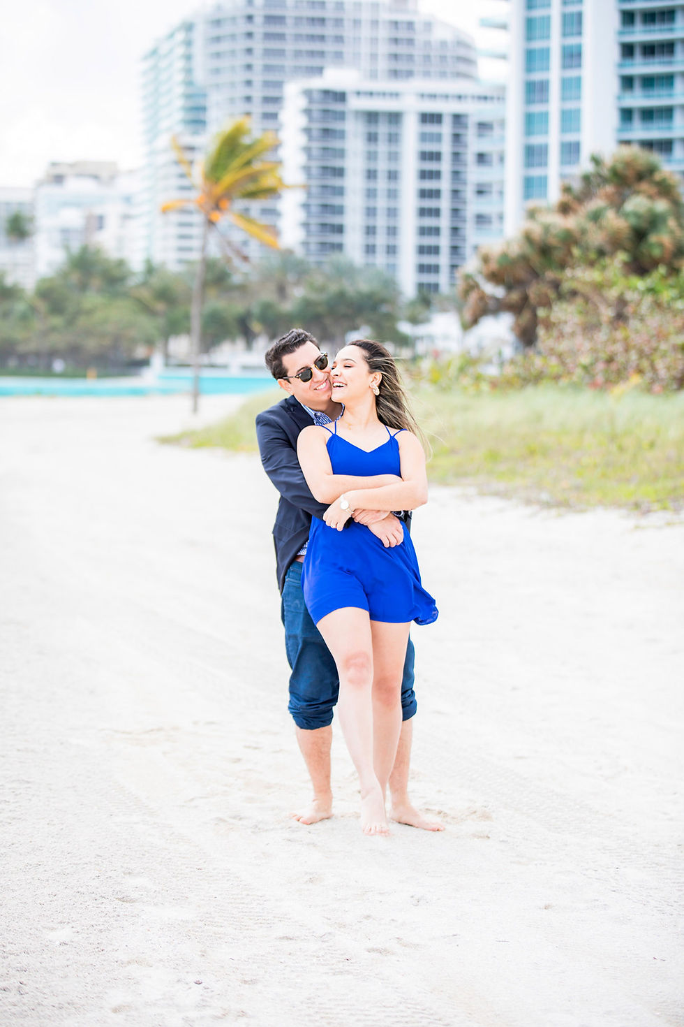 Newly engaged couple on beach