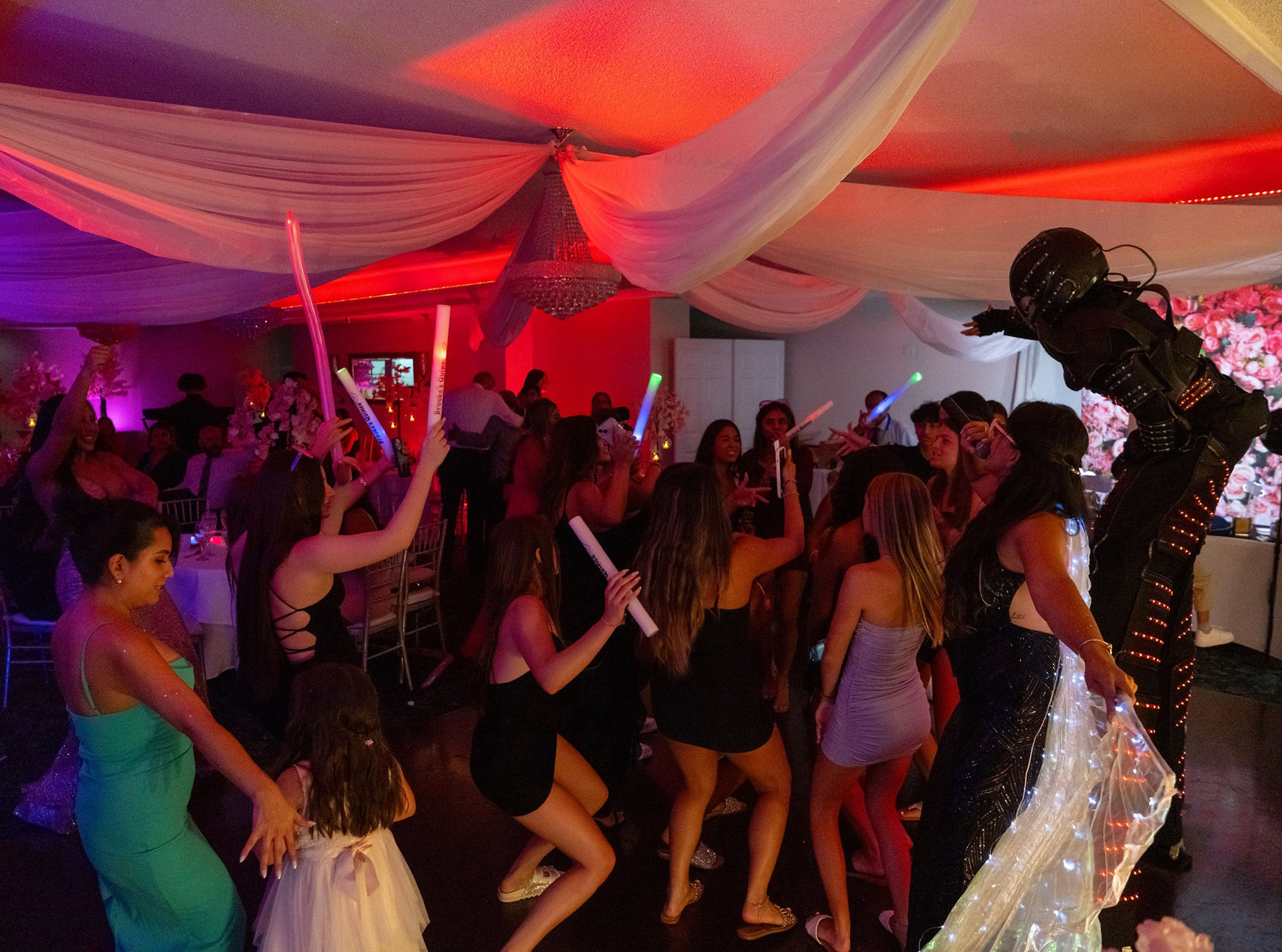 Guests dancing with Hora Loca at Brooke's party at Boca Dunes Golf Club