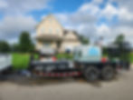 trailer in front of house