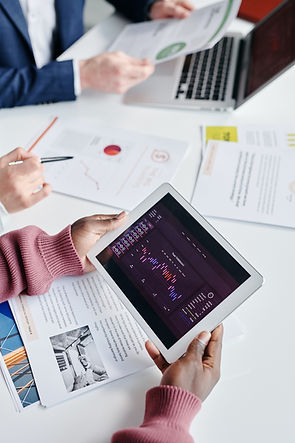 Employees reviewing data at work