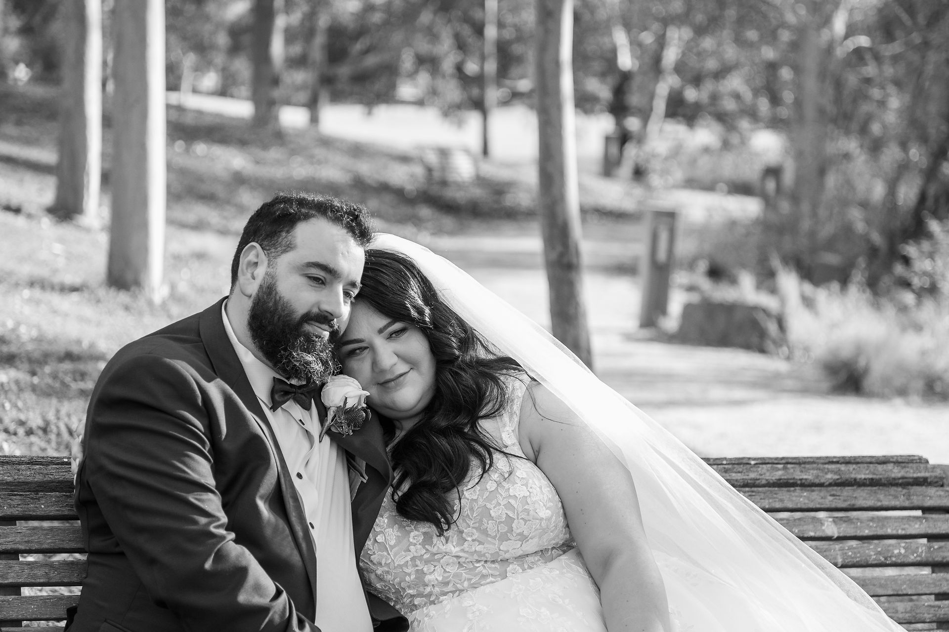 Bride and groom smiling toward camera at Eynesbury Estate wedding