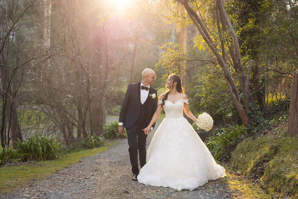 Close-up view of a vintage camera on a wooden table, ready for wedding photography