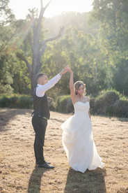 Golden sunset light falling on bride and groom at Potters Receptions Melbourne wedding venue