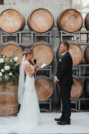 Bride reciting her vows to the groom