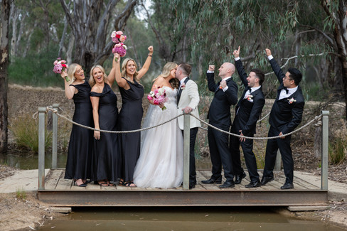 Entire bridal party celebrating together after the ceremony at Dungala Events Centre.