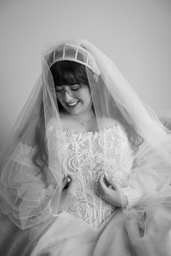 Timeless wedding portrait of bride in flowing wedding dress outdoors
