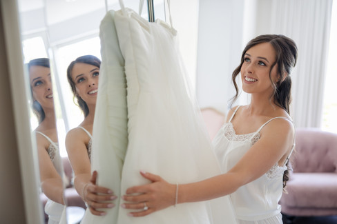 Elegant bridal portrait while the bride prepares for her wedding at Potters Receptions Warrandyte