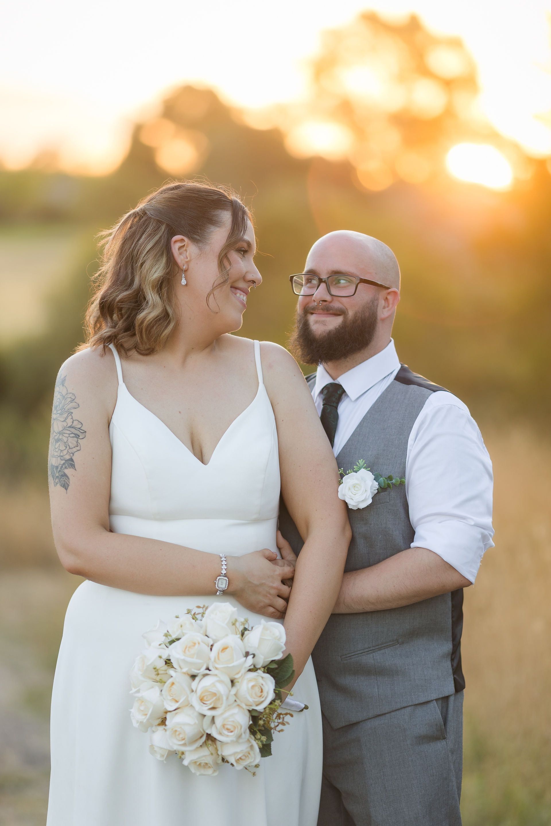 Warm evening light over the greens during Craigieburn Sporting Club wedding portraits at Craigieburn Sporting Club.