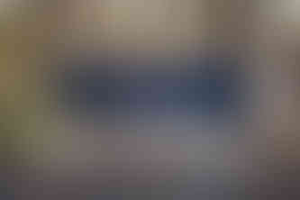 groom arm in arm with groomsmen