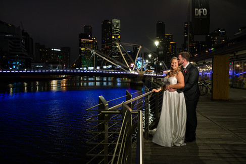 Bride and groom nighttime Melbourne city wedding portrait