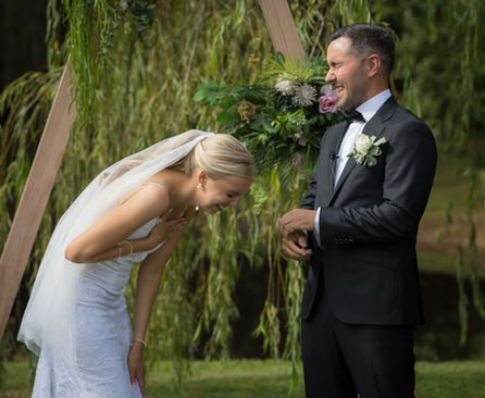 Bride and groom laughing