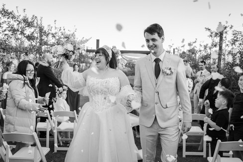 Bridal party celebrating after outdoor ceremony in the Macedon Ranges