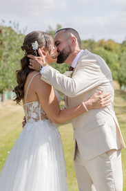 Wedding couple embracing in orchards at DV Cider Darraweit Guim Victoria
