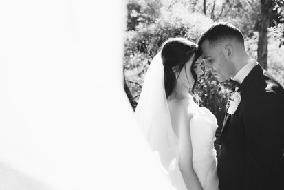 Bride and groom celebrating their marriage during portraits at Potters Receptions