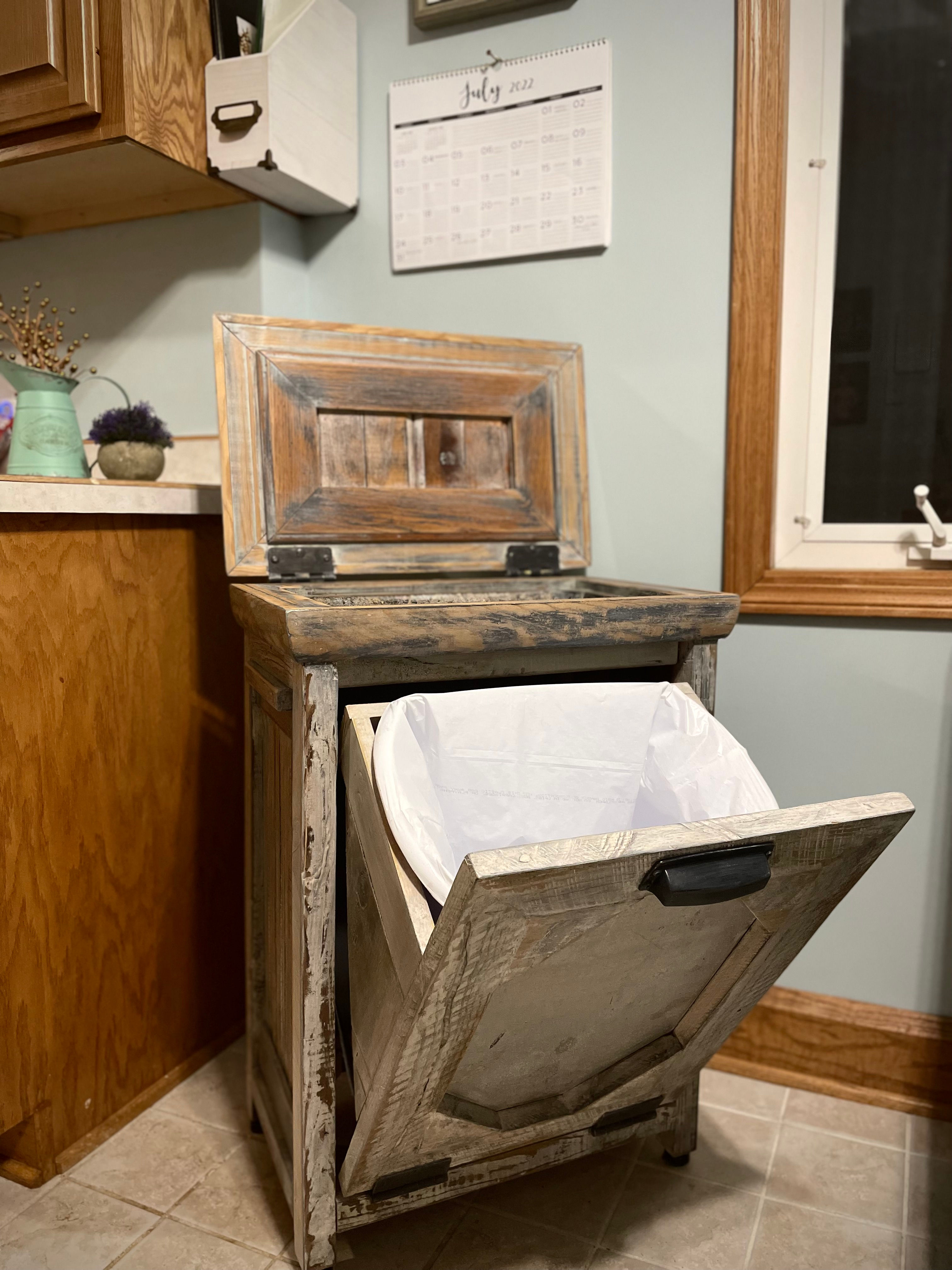 custom farmhouse tilt out trash cabinet with mini lift top storage