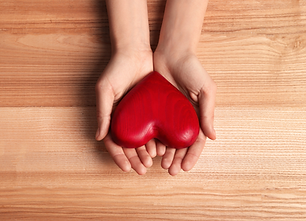 Heart object held in hands