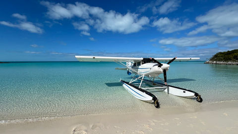 A seaplane at a Bahamian beach