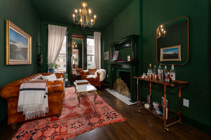 Behind-the-scenes real estate photography for Instagram showing NYC skyline view