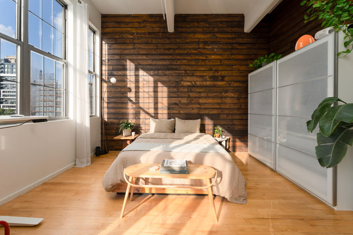 Luxury apartment interior photography in NYC showing open concept living space with natural light