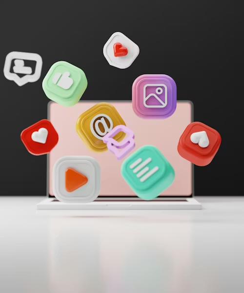 Colorful social media icons hover over a laptop on a white surface with a black background, conveying a digital and connected mood.