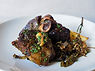 A plate of braised lamb shanks