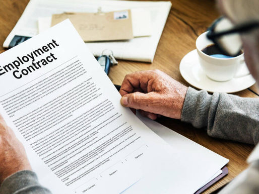 a man reading employment contract