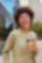 positive-young-woman-with-glad-expression-smiles-happily-hears-something-funny-drinks-take