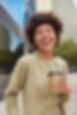 positive-young-woman-with-glad-expression-smiles-happily-hears-something-funny-drinks-take