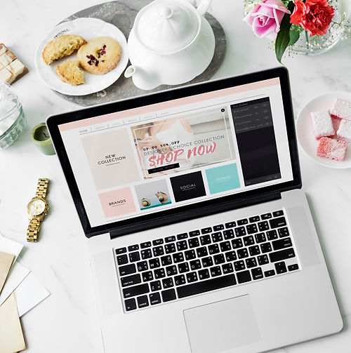 laptop-online-shopping-teapot-cookies-flower-decor-concept.jpg