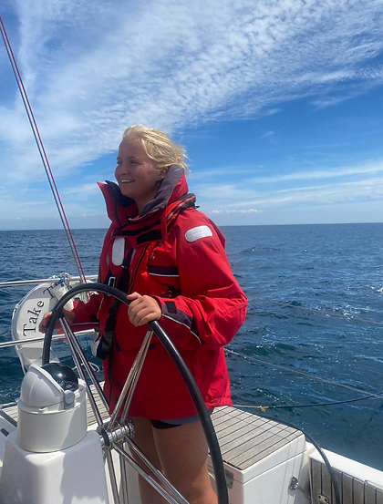 megan-steering-a-boat