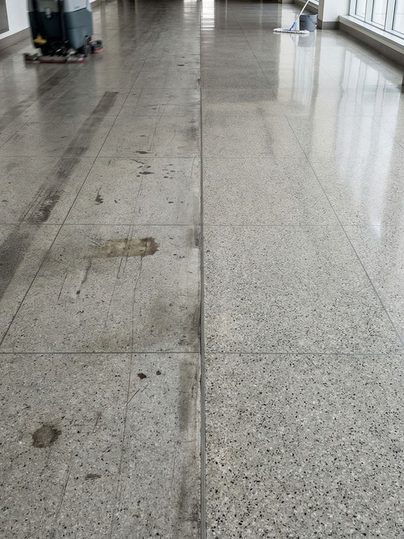 Before and after comparison of high-traffic hallway floor showing worn damage versus professionally restored condition