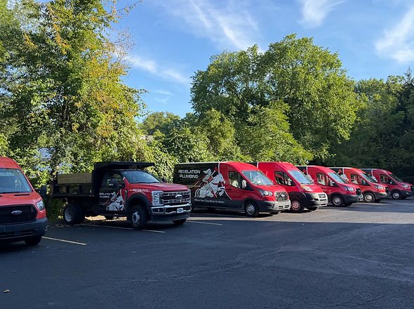 fleet of plumbing vans gettting ready to do an emergency plumbing repair in ross township