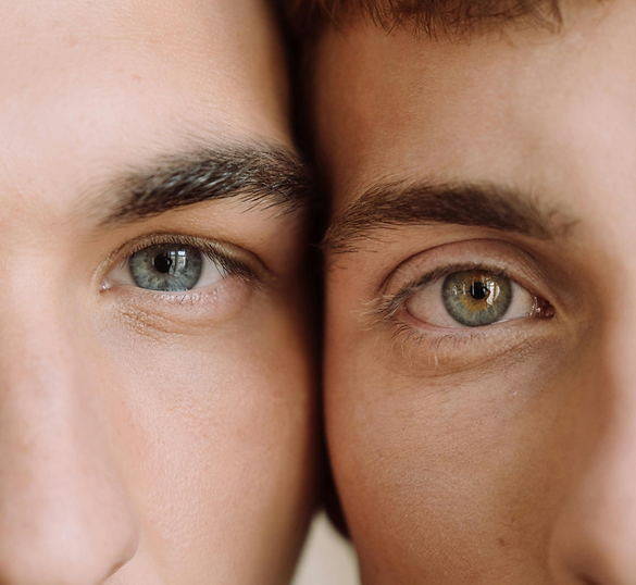 Men showcasing glowing skin after skin booster treatment in Calgary