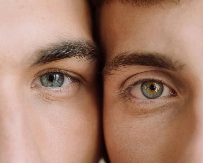 Men showcasing glowing skin after skin booster treatment in Calgary