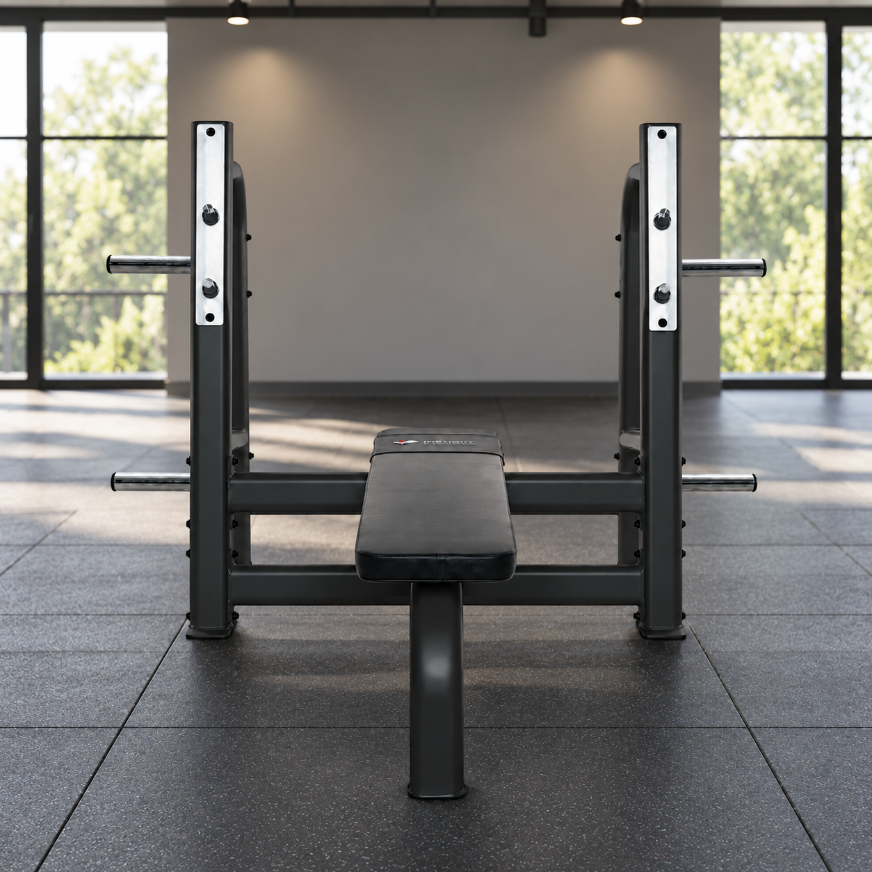 InFlight Fitness Olympic flat bench in a gym setting.