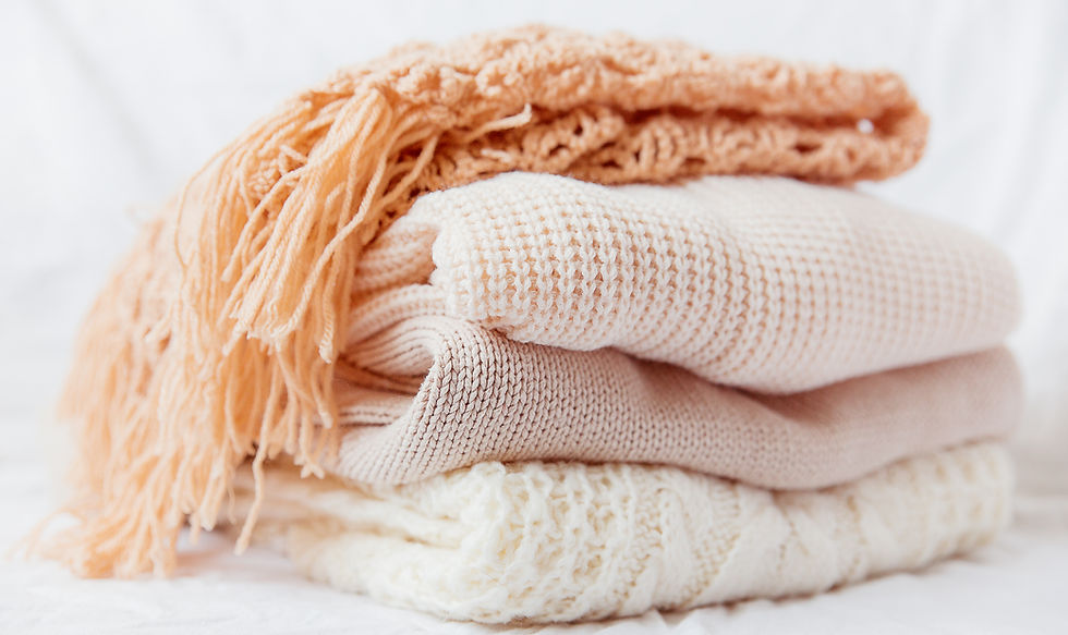 Pile of woolen scarves