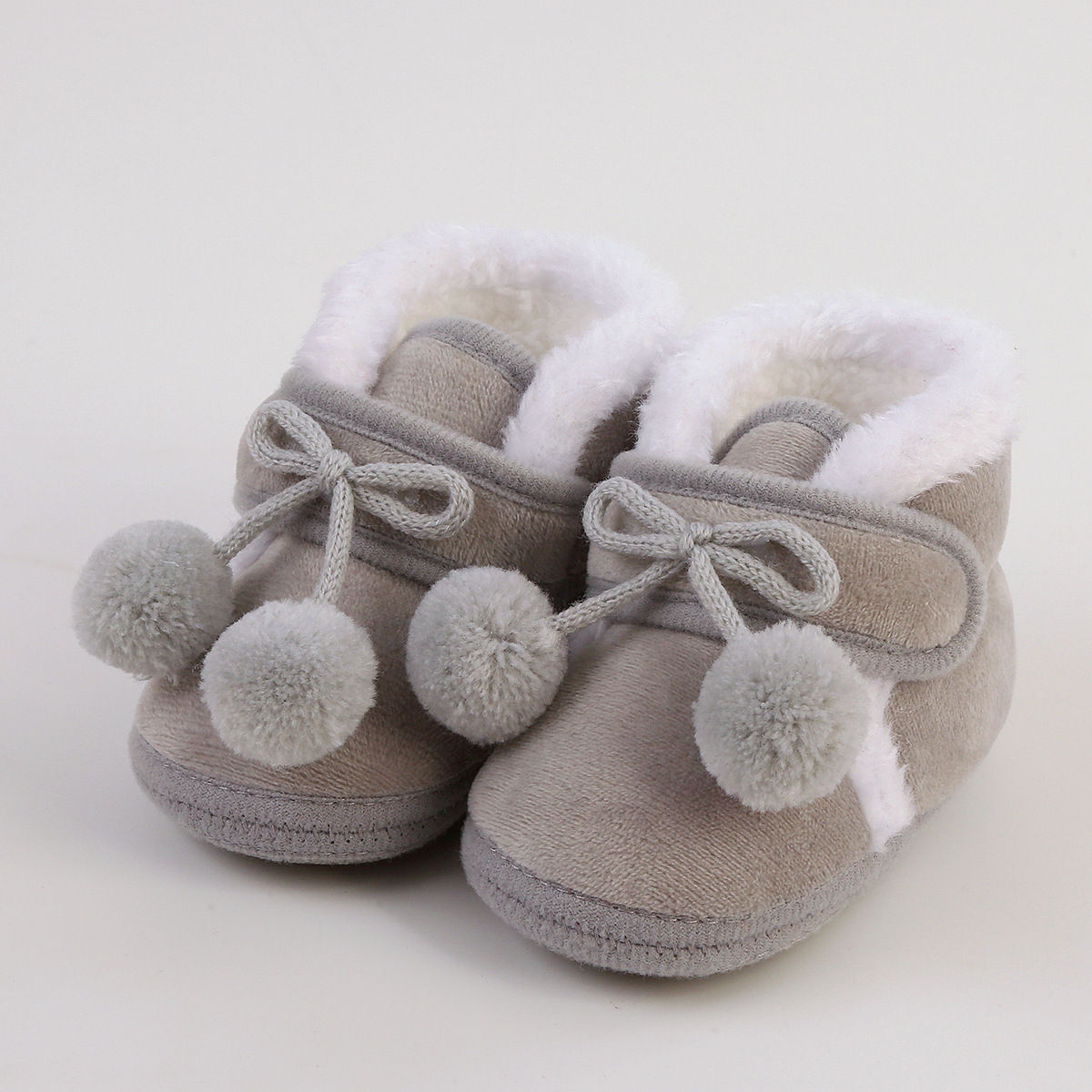 Botas para bebe com pelinho e pompom