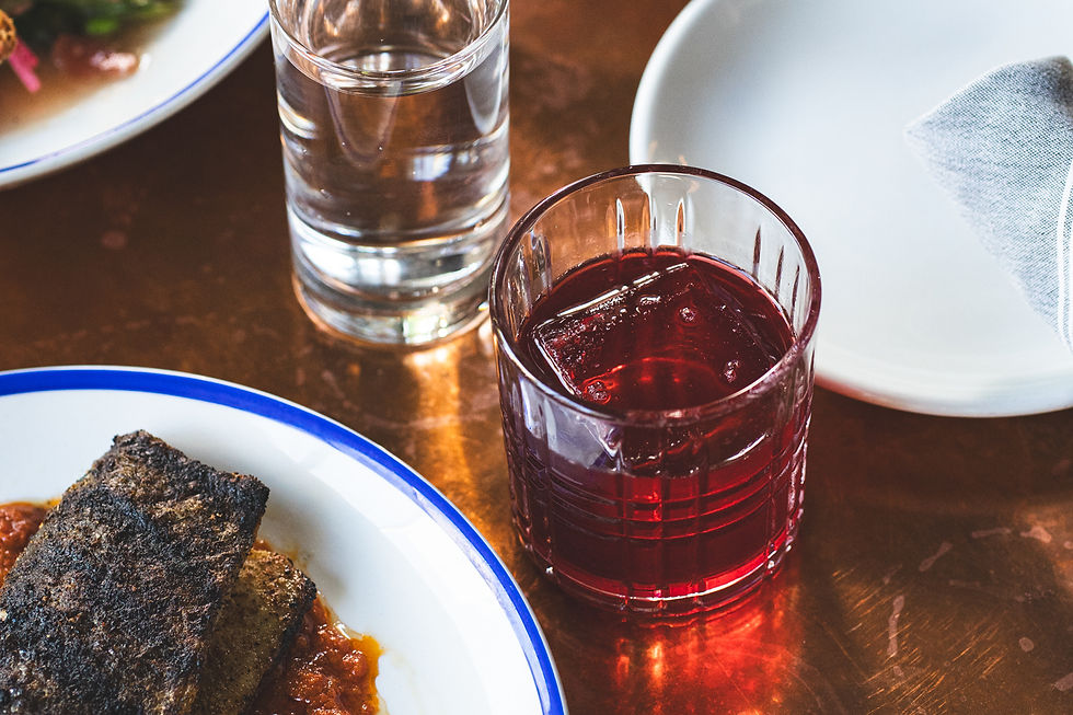 Acquainted With The Night blackberry infused rye. cognac. orange bitters