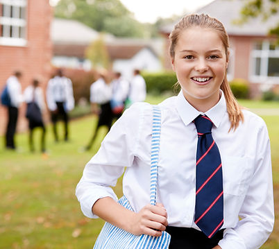 portrait-female-teenage-student-uniform-outside-buildings (2).jpg