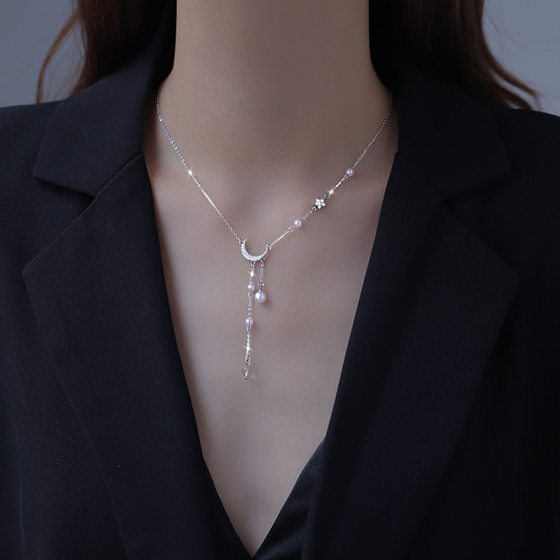 Thumbnail: 925 silver MOON necklace featuring a star and moon, a pearl, and a pendant.