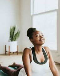 black woman yoga stretch