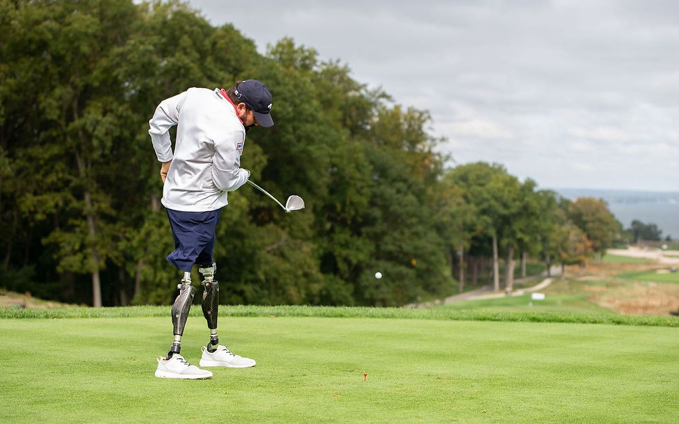 Nick Kimmel who is a double amputee takes a shot on the golf course
