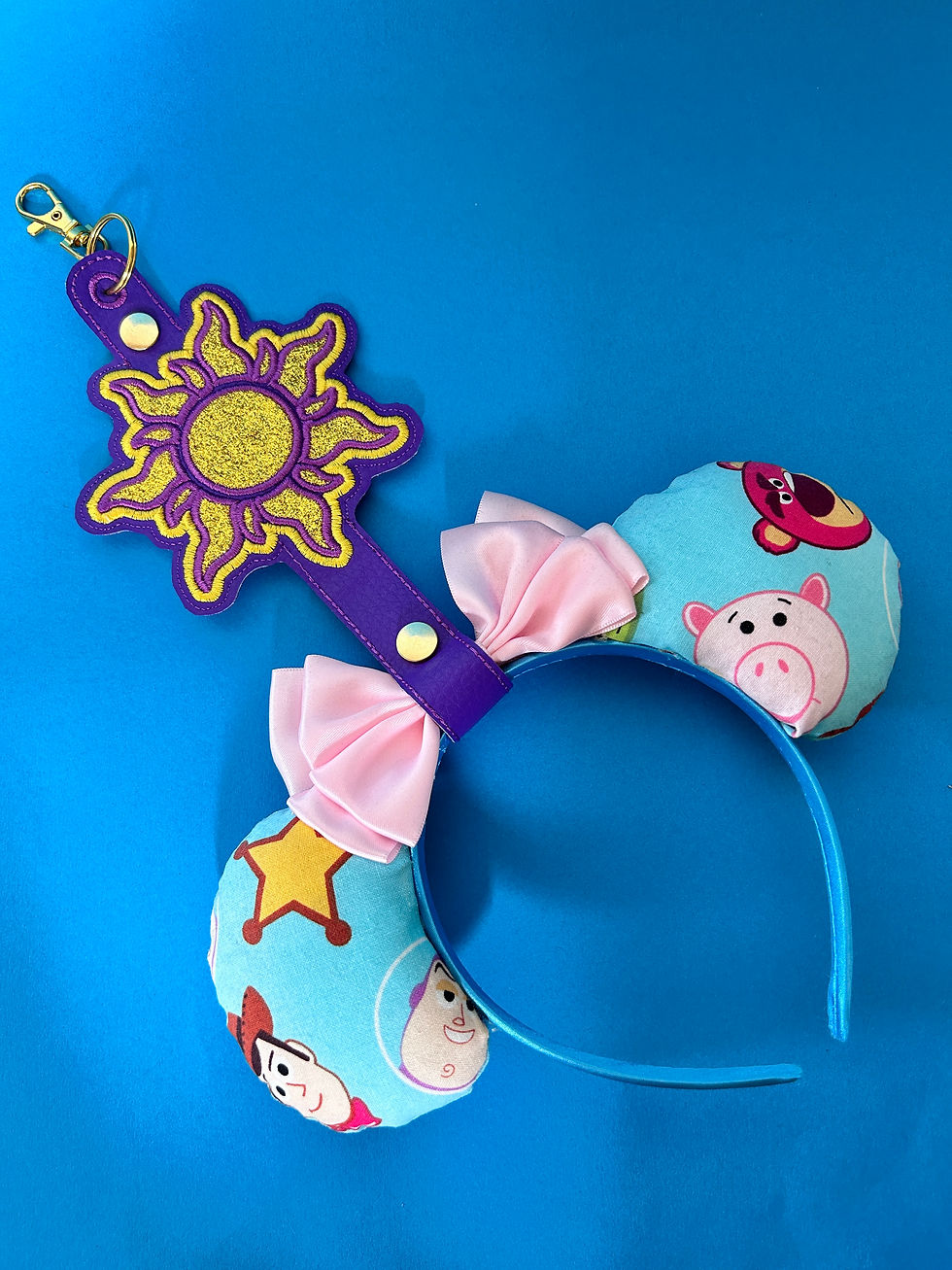Thumbnail: Tangled Sun inspired single ear holder