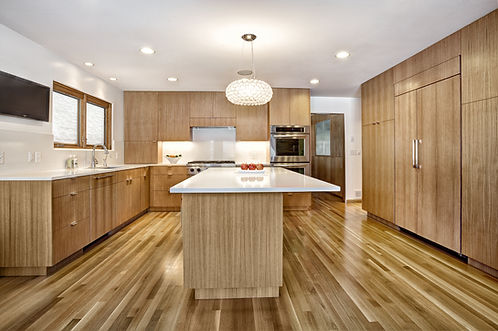 Modern custom quarter sawn white oak cabinets in a modern home. The cabinets are designed